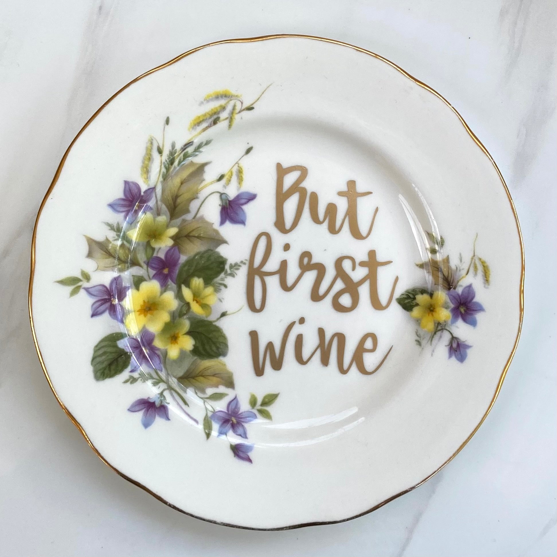 ‘But first wine’ quote on plate