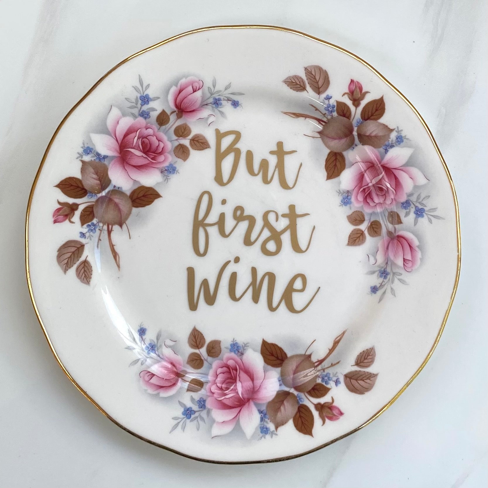 ‘But first wine’ quote on plate