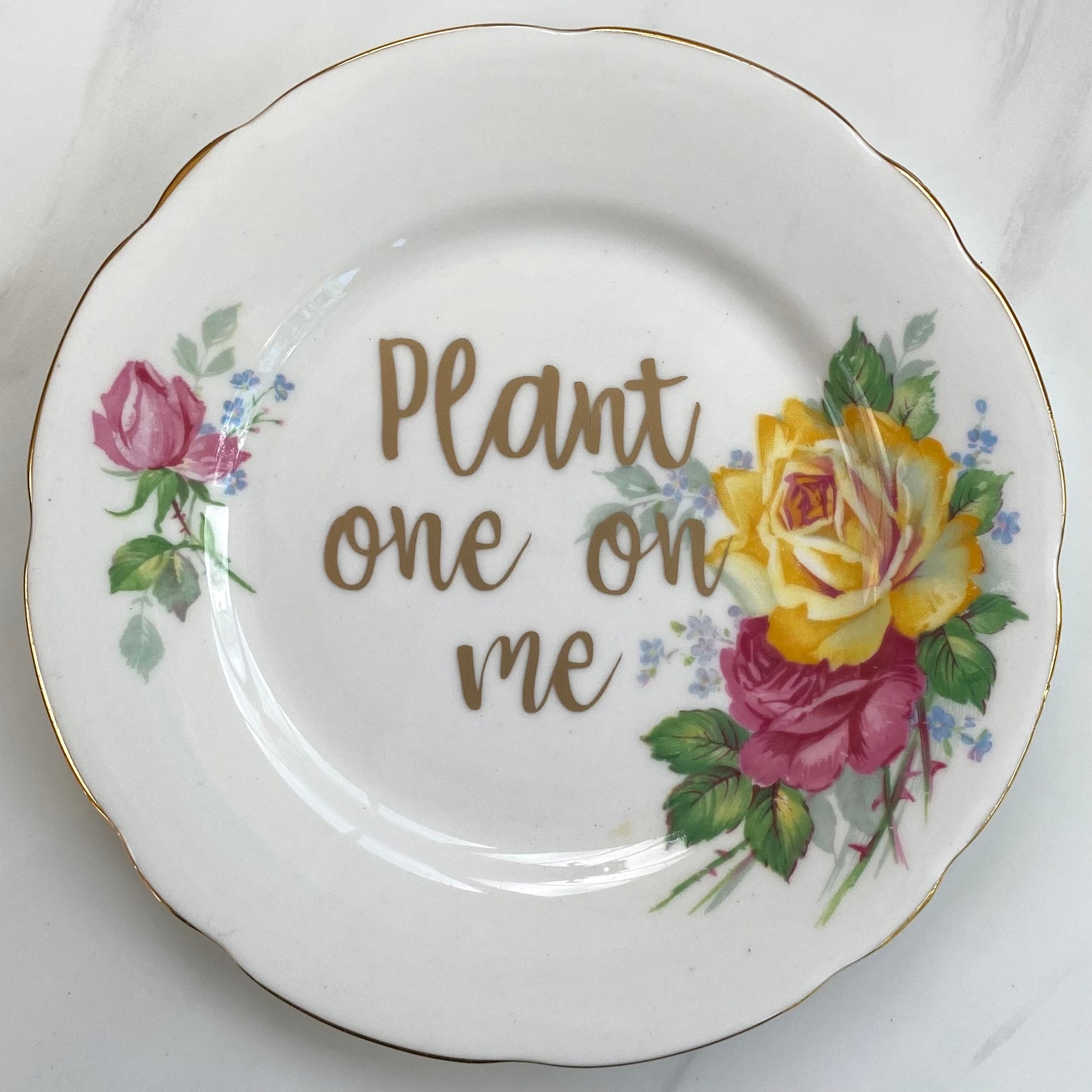 ‘Plant one on me’ quote on plate