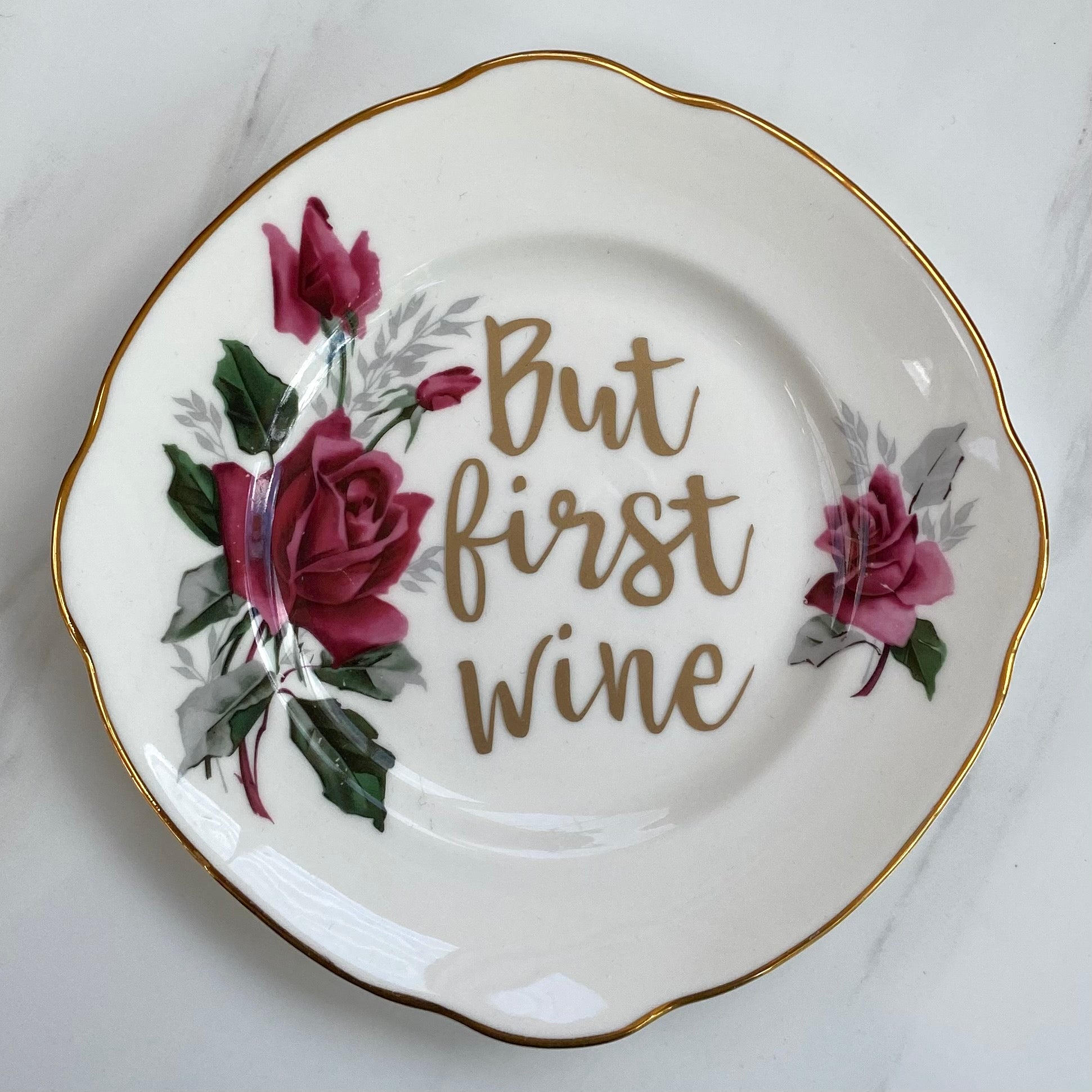 ‘But first wine’ quote on plate