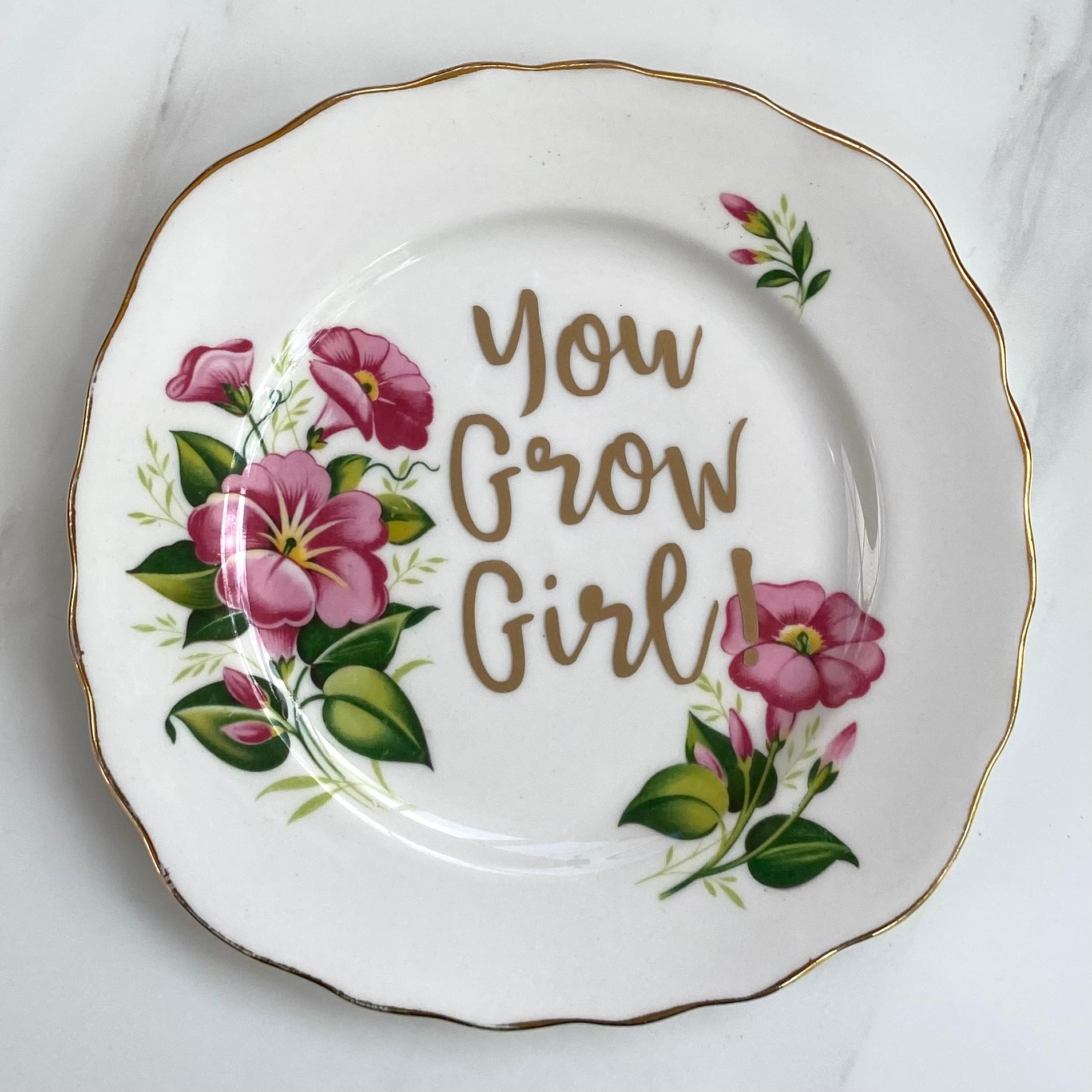 ‘You grow girl!’ quote on plate