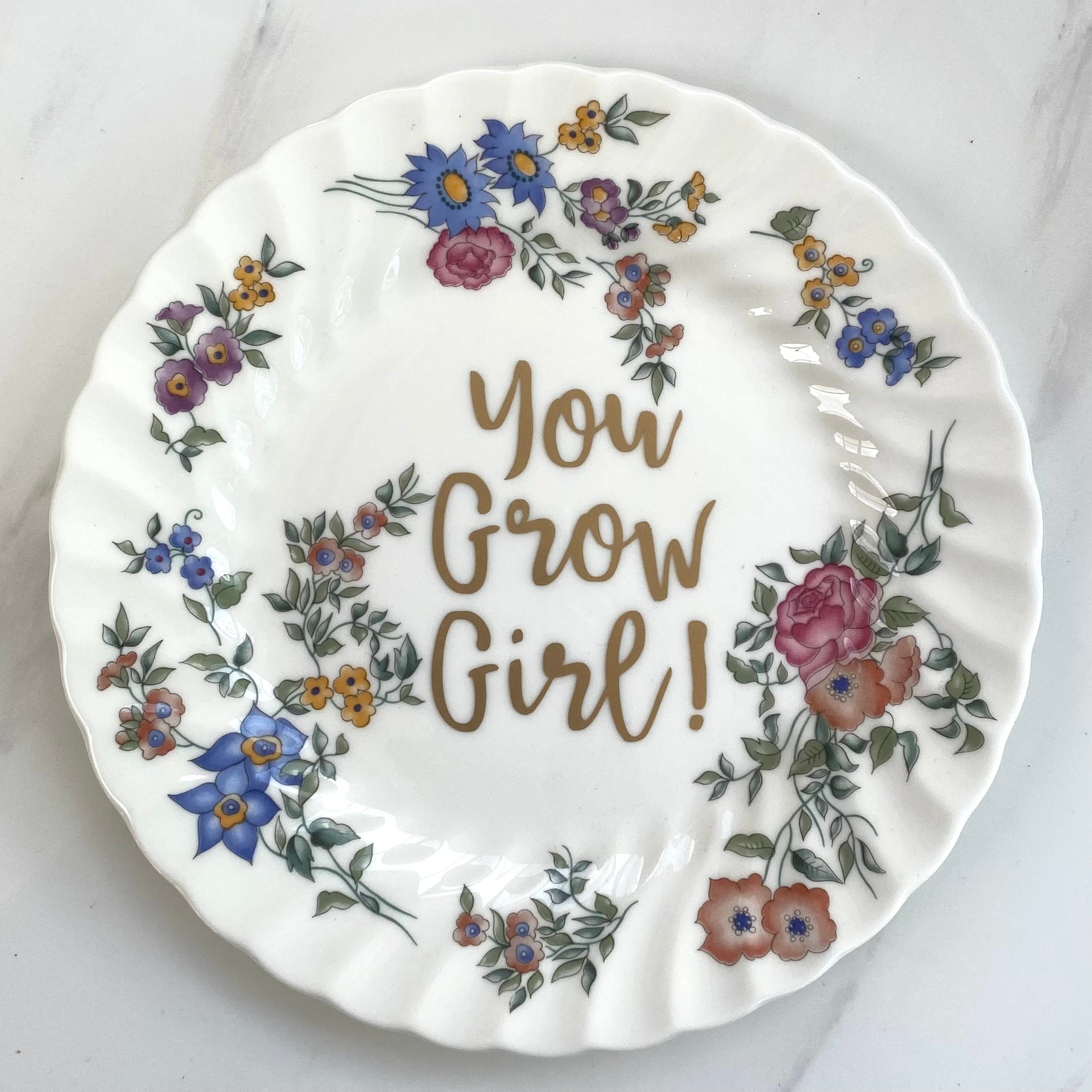‘You grow girl!’ quote on plate